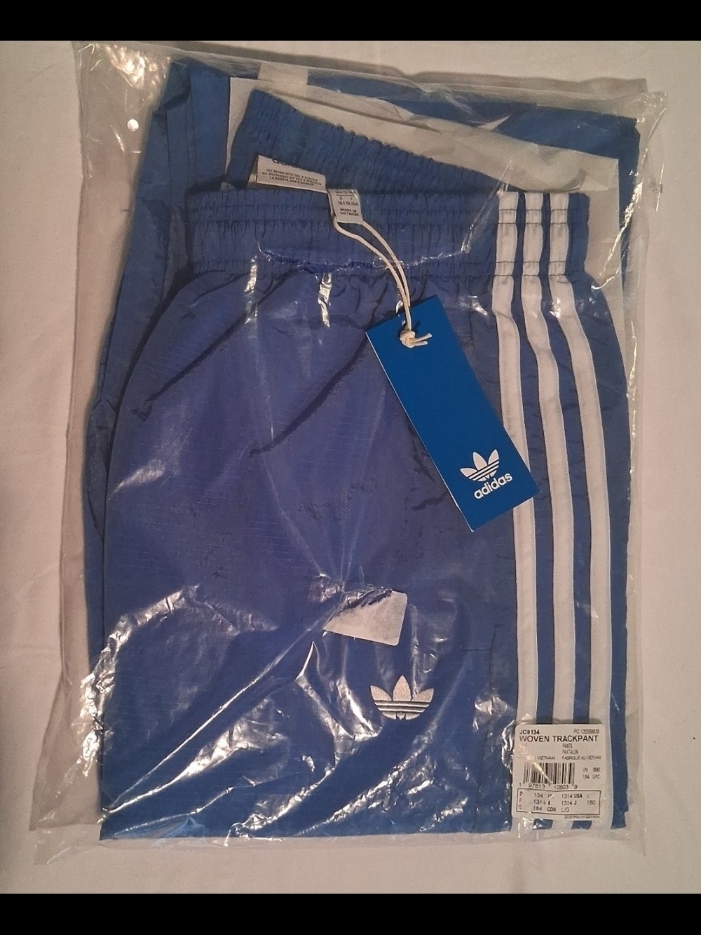 adidas Blue Track Pants with White Three-Stripes